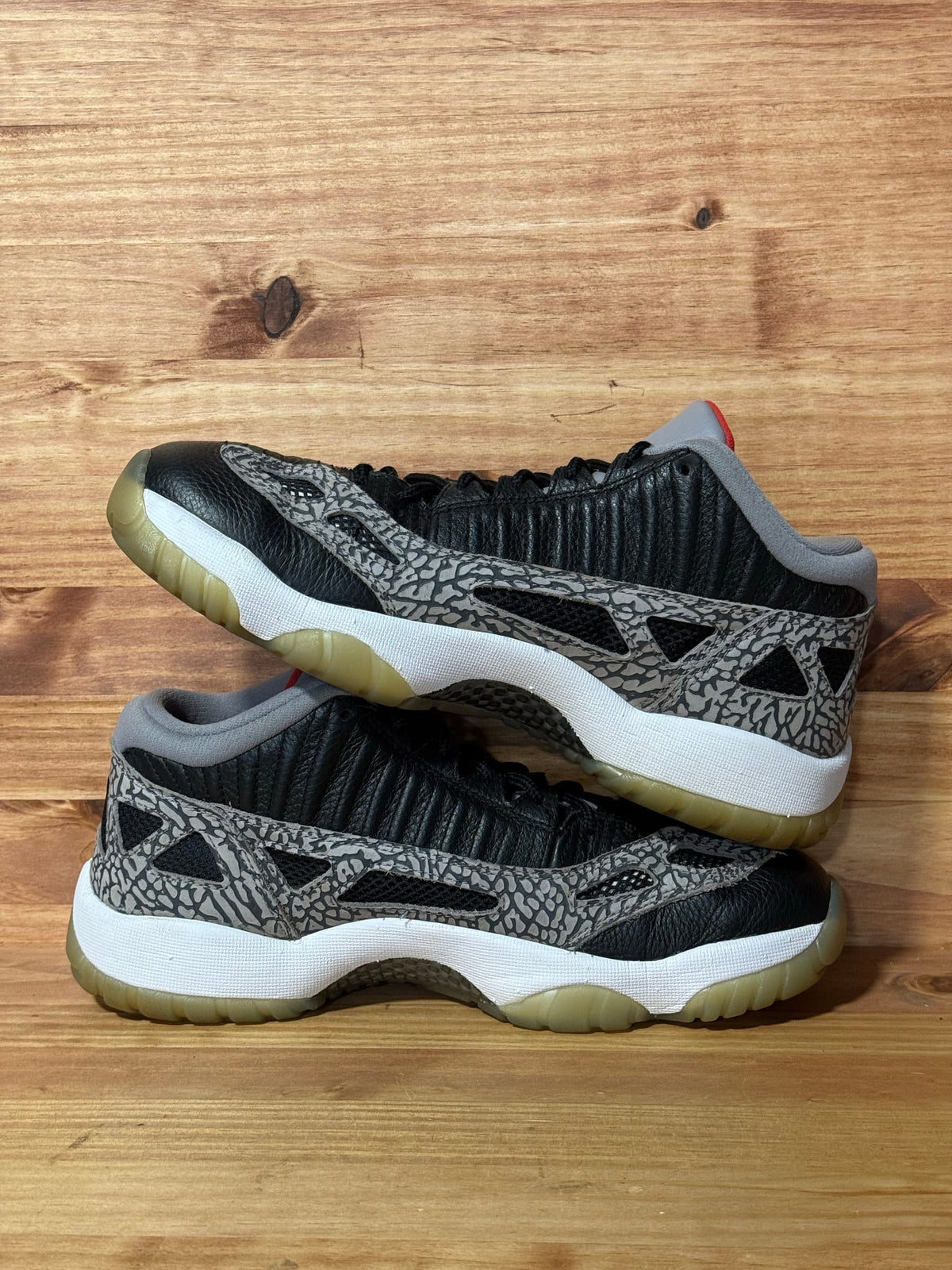 Jordan 11 Retro Low IE Black Cement - Size 9.5